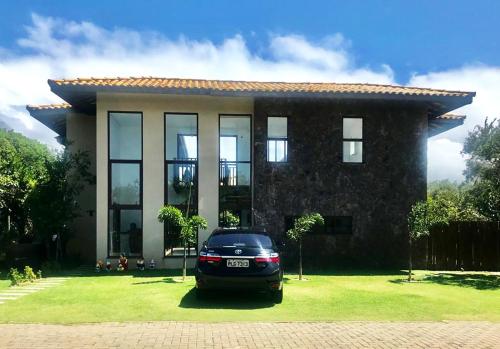 Casa com piscina e churrasq na Praia do Forte BA