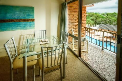 Sandcastles Holiday Apartments The 3.5-star Sandcastles Holiday Apartments offers comfort and convenience whether youre on business or holiday in Coffs Harbour. The hotel offers guests a range of services and amenities designed to