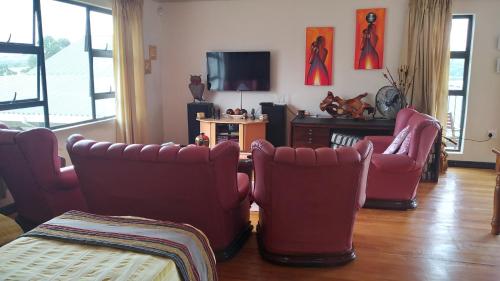 Lounge/area TV in comune, Goggas Nest BNB & Restaurant in Manzini