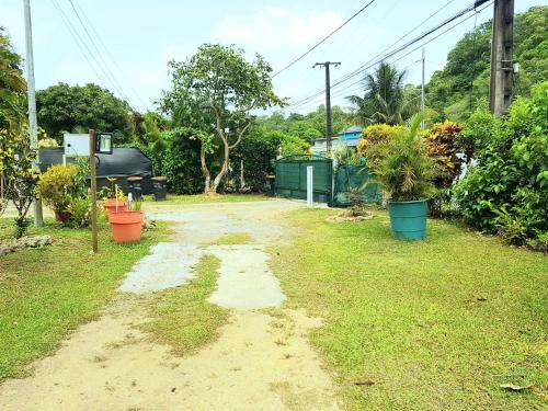 Εξωτερική όψη, Maison charmante aux Abymes avec terrasse et jardin. in Les Abymes
