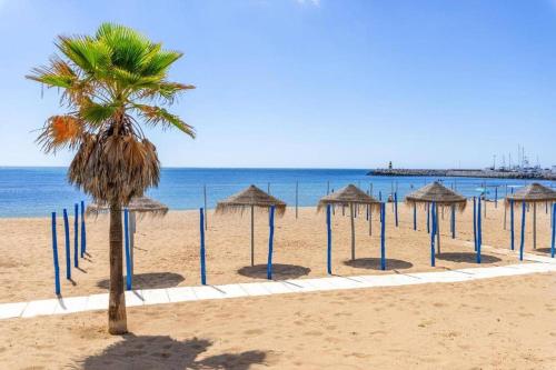 Carihuela Front Beach - Tap to explore photos