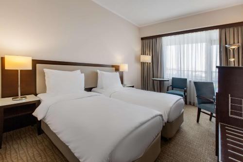 Double or twin room, superior, city view, balcony