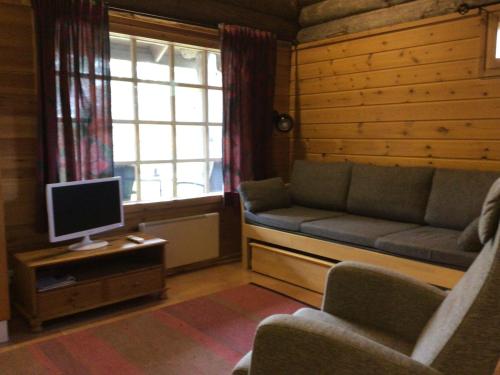 Shared lounge/TV area, Petajalammen Turistimajat in Kuusamo