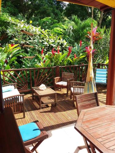 Balcony/terrace, Bungalow charmant a Pointe-Noire avec piscine partagee in Pointe-Noire