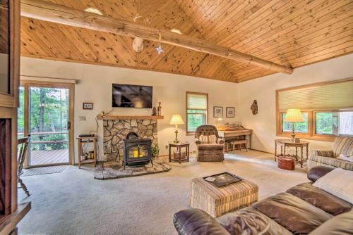 Riverfront Oconto Cabin with Fire Pit and Yard! in Oconto, USA