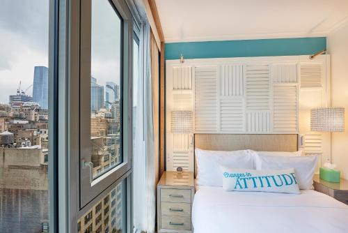 Margaritaville Resort Times Square Room Type - Premium Room One Queen Bed Margaritaville Resort Times Square Room Type - Premium Room One Queen Bed