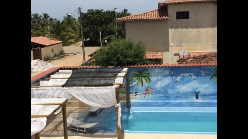 Casa Temporada Frente à Praia Piscina Ar cond Nova Viçosa VA