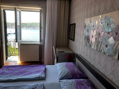 Apartments and rooms by the sea Barbat, Rab - 4973