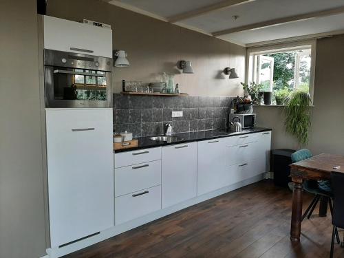 Appartement Voorhuis en chalet Klein Waterland, Amsterdam (photo 8)