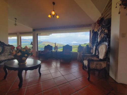 Előcsarnok, Balcon al Cotopaxi Hosteria in Rumipamba