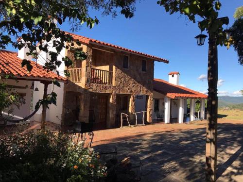 320537996 El Pueblito Hotel Boutique