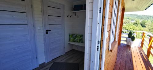 Sielanówek - Orzechowa Chatka z sauną wanną termalną jacuzzi (Sielanowek - Orzechowa Chatka z sauna wanna termalna jacuzzi) in Bjerna