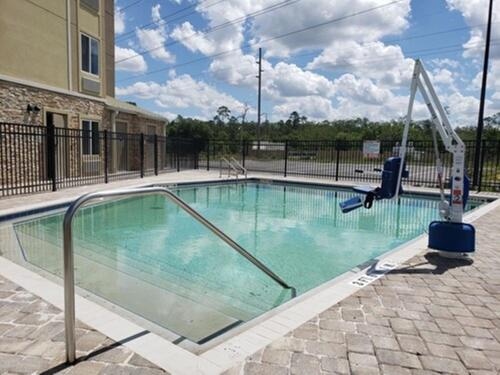 Swimming pool, Woodspring Suites Orlando International Drive in Lake Bryan