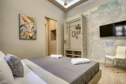 Plaka Filotheis House A - Tap to explore photos