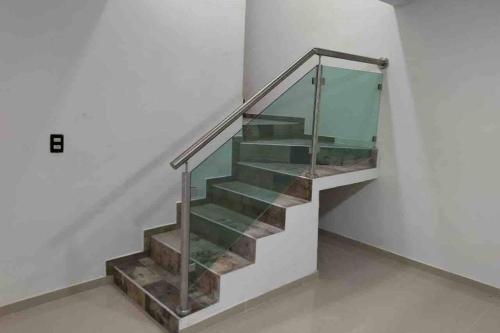 Casa minimalista tranquila y acogedora, con garage Casa minimalista tranquila y acogedora, con garage