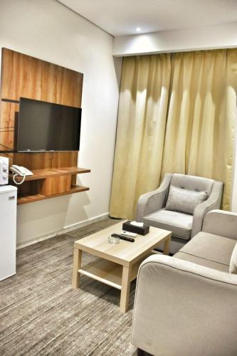 Doolv Hotel Apartments - Tap to explore photos