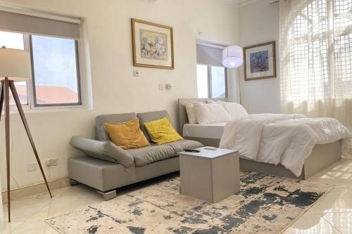 Urban furnished studio apartment with a pool