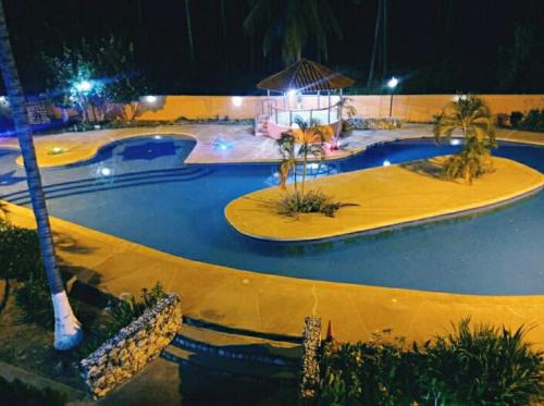 Swimming pool, Villa Vacacionales Los Cayos Con Playa Privada in Boca de Aroa