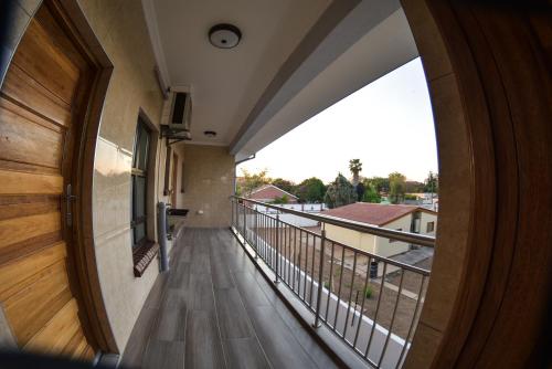 Balcony/terrace, Apartment Two-One-Two Eleven in Gaborone