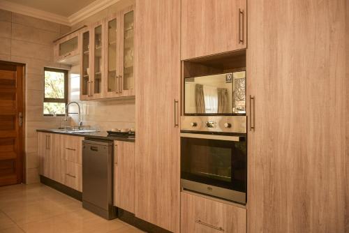 Kitchen, Apartment Two-One-Two Eleven in Gaborone