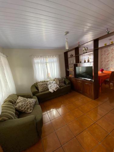 Shared lounge/TV area, Casa Veraneio em Zimbros - Bombinhas in Sertaozinho