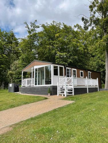 Percy Wood Lodges with Hot Tubs - Accommodation - Swarland