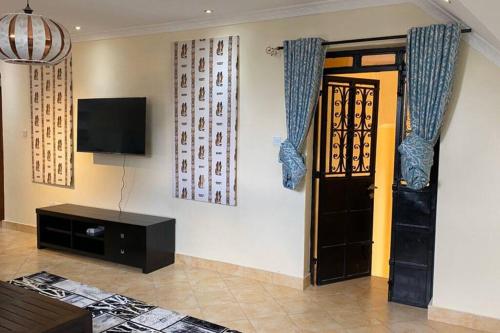 Tsavo House-A cosy home 15 min from the JKIA Airport and SGR Terminus