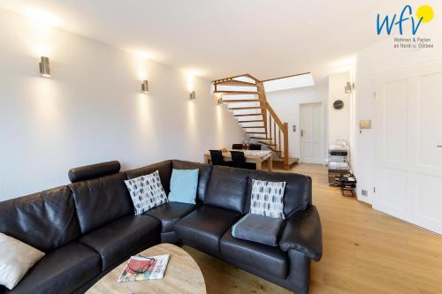 Haus Greune-Stee 49 - Ferienwohnung Suedstrandkrabbe, Borkum