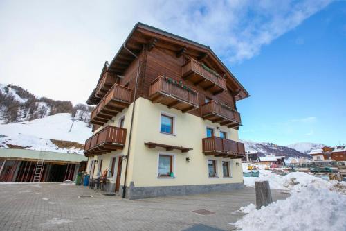 Italia 2 Ski in-Ski out Mt 50 - Happy Rentals Livigno