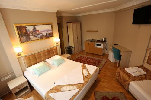 Tashkonak Studio Suites - main image