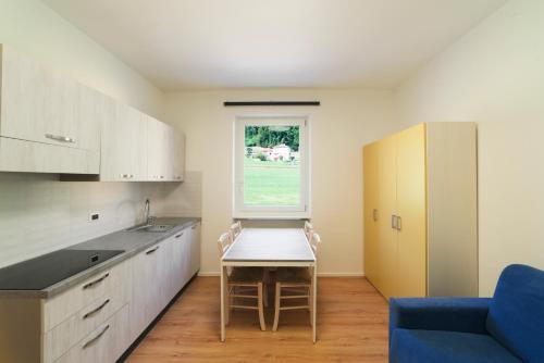 virtuve, Fioralpino Apartments in Sospirolo