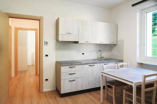 virtuve, Fioralpino Apartments in Sospirolo