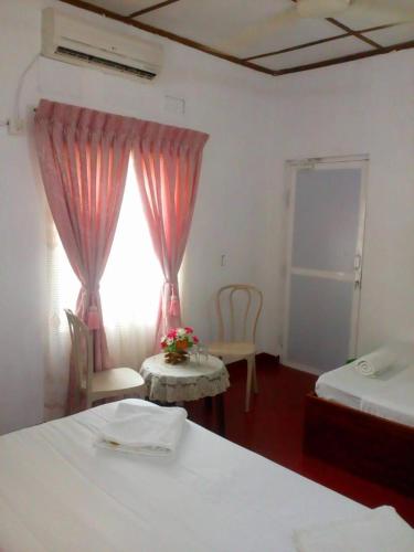 Midland Hotel Rooms Kanampella in أخرى