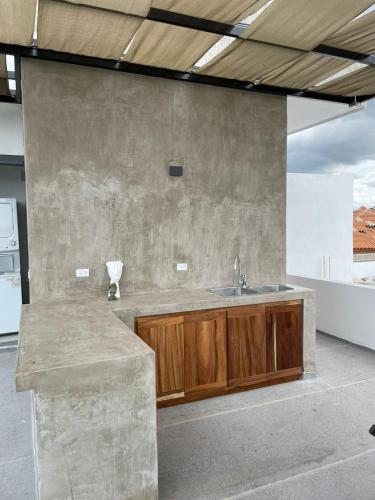 Ancla Baja Living Condominio nuevo con vista 1