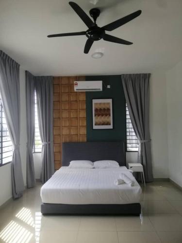 a bedroom with a large bed and a large window, Johor Desaru Beach Semi-D Bungalow in Desaru