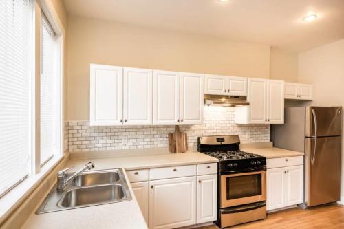 Charming 4BD Gem with Balcony and Patio - main image