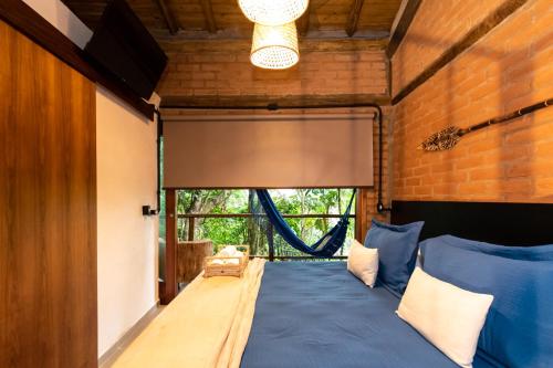 Lotus Loft 02: Refuge in the middle of nature at Felix' beach, 100mbps Internet + Smart TV, Full Kit