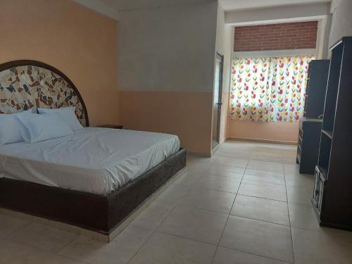 Auto hotel Jardines de Amatitlan