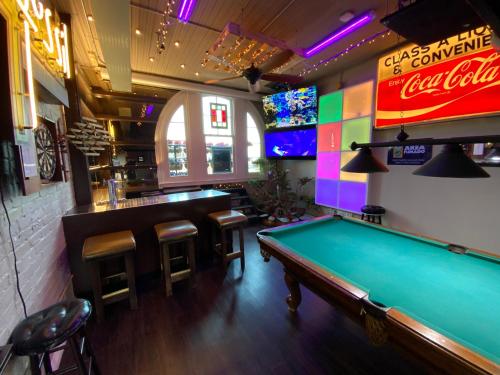 Pool table/Bar/Conference Room/w Balcony Loft in the Heart of Omaha’s Old Market