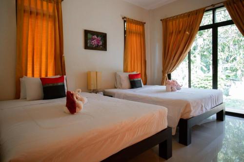 Baan Klong Resort - Tap to explore photos