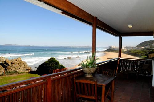 balkon/terras, Singing Kettle Beach Lodge in Keurboomstanu