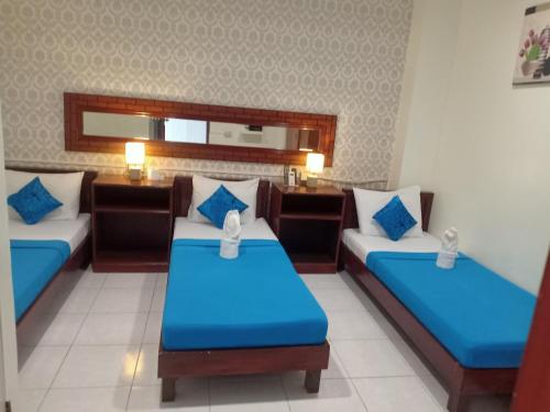 Davao Hub Bed and Breakfast Room Type - Comfort Triple Room
