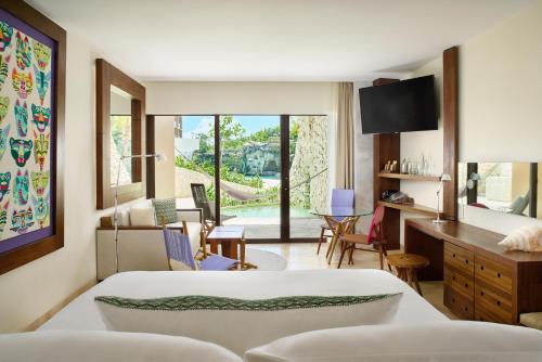 322879411 Hotel Xcaret Arte - All Parks All Fun Inclusive - Adults Only