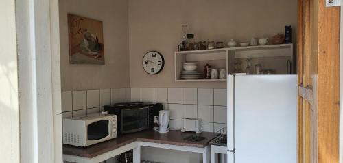 廚房, 德拉肯斯堡叢林背包客旅館 (Drakensberg Bush Lodge and Backpackers) in 溫特頓