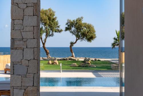 View, Artemis Villa, Beachfront Retreat with Heated Pool, By ThinkVilla in Voukolies