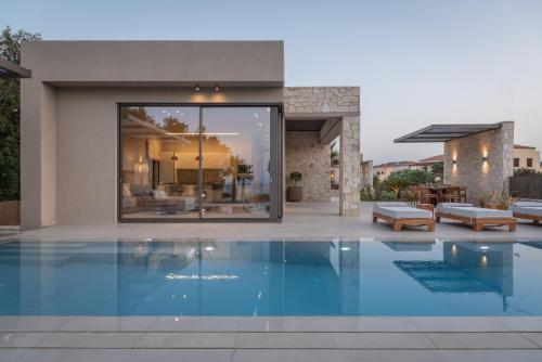 Exterior view, Artemis Villa, Beachfront Retreat with Heated Pool, By ThinkVilla in Voukolies