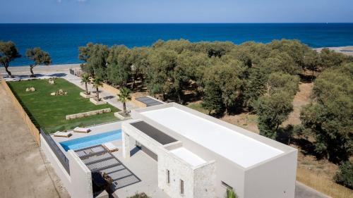 Exterior view, Artemis Villa, Beachfront Retreat with Heated Pool, By ThinkVilla in Voukolies