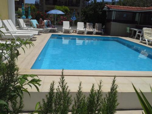 Karaca Apart Hotel - Tap to explore photos