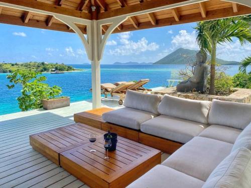Luxury 7BR waterfront villa with views of Marina Cay and Scrub Island in Tortola