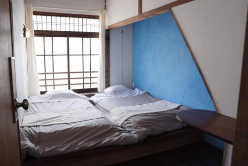 Taketa Ekimae Hostel cue